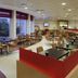 Ibis Paris Montmartre Sacré-Coeur breakfast dining area with red booths and tables in Paris