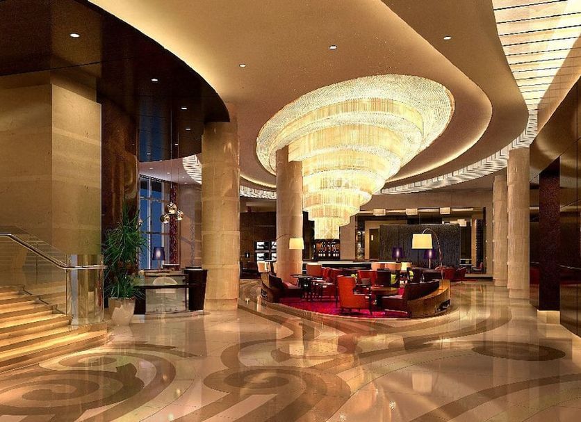 Renaissance Shanghai Putuo Hotel lobby in Shanghai with a grand chandelier and polished marble floors