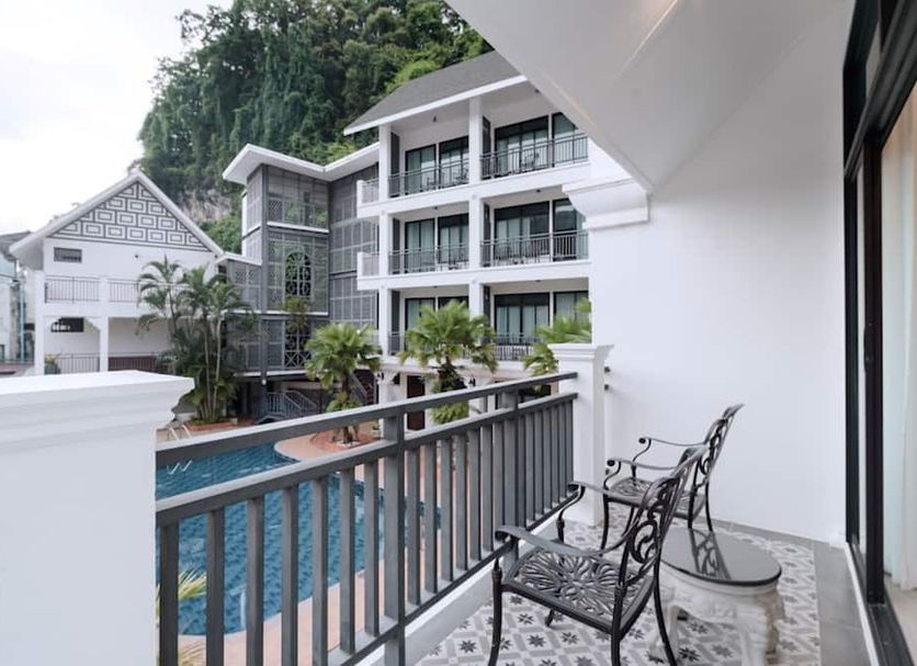 Balcony view of Sabai Mansion Pool & Spa in Krabi overlooking the pool and tropical courtyard