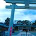 Vessel Inn Hiroshima Station entrance framed by a large torii gate in Hiroshima