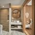 Vias Hotel Vung Tau bathroom with freestanding tub, walk-in shower, and vanity in Vung Tau