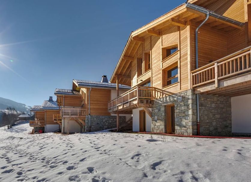 Terresens - Les Fermes Du Mont-Blanc in Combloux, chalet-style hotel exterior with snowy mountain setting