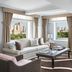 The Ritz-Carlton New York Central Park suite with park and skyline views through large windows