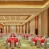 Four Points by Sheraton Chengdu, Pujiang Resort banquet hall with round tables and white chairs