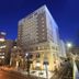 Daiwa Roynet Hotel Yokohama-Koen in Yokohama at night, street view of a tall illuminated hotel