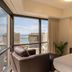 Bishop Suites at The Executive Centre Honolulu suite with city and ocean view balcony