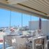 Malù Bed&Breakfast in Polignano a Mare terrace dining area with sea and town views