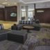 Courtyard by Marriott Nashville Goodlettsville lobby with modern seating and front desk in Goodlettsville.