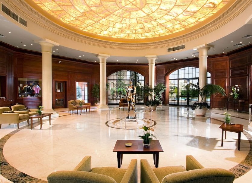 Stella Golf Hotel in Ain Sokhna lobby with ornate domed ceiling, marble floor, columns and seating area