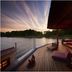 Aomoriya by Hoshino Resorts in Misawa, lakeside wooden deck at sunset with seating and water view