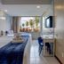 Hotel Praia do Sol in Ilhéus guest room with two beds and oceanfront palm-tree view