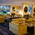 Grand Hotel del Mare Resort & Spa in Bordighera lounge with gold armchairs and large windows