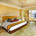 Dongjiao State Guesthouse in Nanjing guest room with king bed, desk and large city-view window
