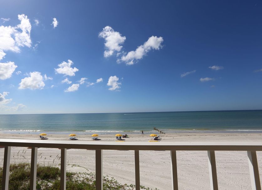 Shoreline Island Resort in Madeira Beach with balcony view of white sand beach and ocean