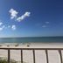 Shoreline Island Resort in Madeira Beach with balcony view of white sand beach and ocean