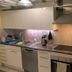 Svea Hostel Stockholm kitchen with stove, sink, microwave and dish rack
