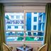 Sun Park Resort, Chandigarh room balcony with two chairs and small table overlooking courtyard