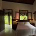 Pousada Morro dos Navegantes in Ilhéus guest room with bed and open windows to lush tropical views