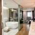 Hotel28 Myeongdong, Seoul: modern suite with freestanding tub, glass shower, vanity, and sitting area