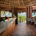 Catalonia Grand Costa Mujeres All Suites & Spa bar with ocean view in Punta Sam and thatched roof seating