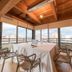 Ristorante Hotel Lucia in Giulianova meeting room with table, chairs, and large windows with city view