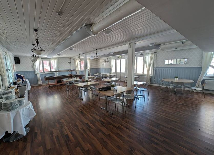 Örnvik Hotell & Konferens in Luleå conference room with tables, chairs and wood flooring