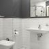 London Boutique Hotel in Chisinau bathroom with glass shower, wall-mounted sink, and toilet