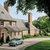 Shepherd's Run in South Kingstown, historic stone hotel with landscaped grounds and a vintage car