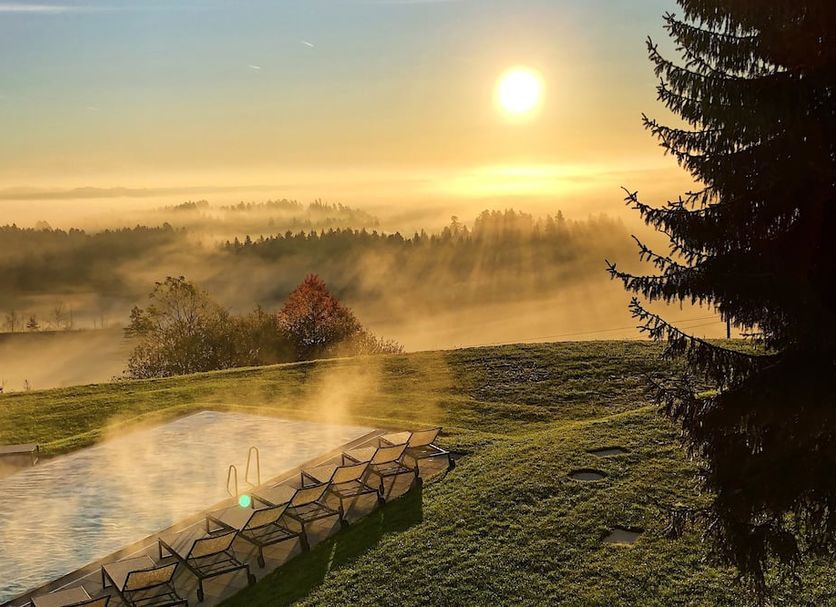 Fritz Lauterbad in Freudenstadt with outdoor infinity pool and misty sunrise view