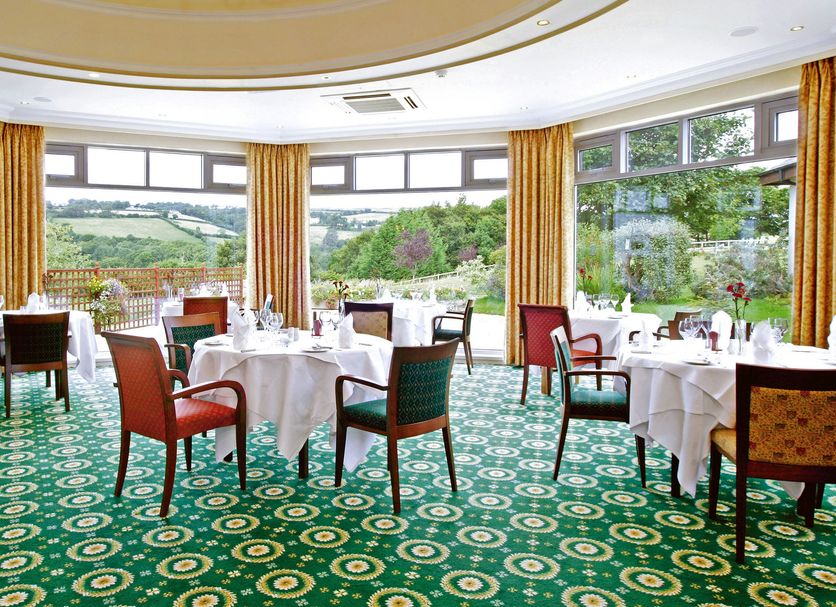 Ilsington Country House Hotel & Spa dining room with countryside views in Newton Abbot