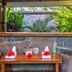 Paradise Cove Resort, Naukacuvu Island: rustic outdoor bathroom vanity with double sinks and tropical garden view