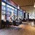 Elite Stadshotellet Växjö in Vaxjo lobby lounge with dining tables, chairs and large windows