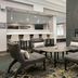 Residence Inn by Marriott Birmingham Hoover lobby seating area with round table and bar-style counter