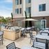 Homewood Suites by Hilton Aliso Viejo - Laguna Beach patio with poolside dining and BBQ grill