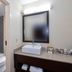 Red Roof Inn Kenly - I-95 bathroom with vanity, sink, mirror, and shower curtain