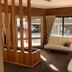 Kingswood Motel in Tocumwal lounge with cream sofas, brick walls and large windows