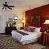 Hacienda La Magdalena in Zapopan room with king bed, ceiling fan, and patterned rug