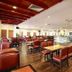 The Putra Regency Hotel, Kangar: spacious hotel restaurant with red chairs and wooden floors