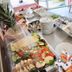 Breakfast buffet at Hotel Garni Niedernhausen in Niedernhausen with fruit, pastries, cheese and tea