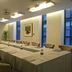 Zhuhai Zobon Art Hotel meeting room in Zhuhai with long conference table and upholstered chairs