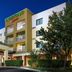 Courtyard by Marriott Charlotte Gastonia hotel exterior in Gastonia with lit entrance and trees