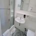 Elbbrücken Hotel Hamburg bathroom with shower, sink, mirror and towel rail