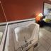 Super 8 By Wyndham Pontoon Beach IL/St. Louis MO Area room with whirlpool tub and king bed