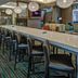 Residence Inn by Marriott Norfolk Downtown bar with long communal table, stools and lounge seating in Norfolk