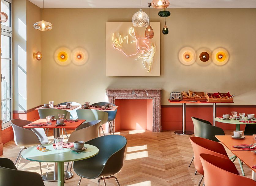 Hotel De Cambis, BW Premier Collection in Avignon with a stylish lounge, fireplace, and colorful tables
