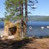 Nisser Hyttegrend Og Camping in Treungen: lakeside cabin with deck and small boats on the water