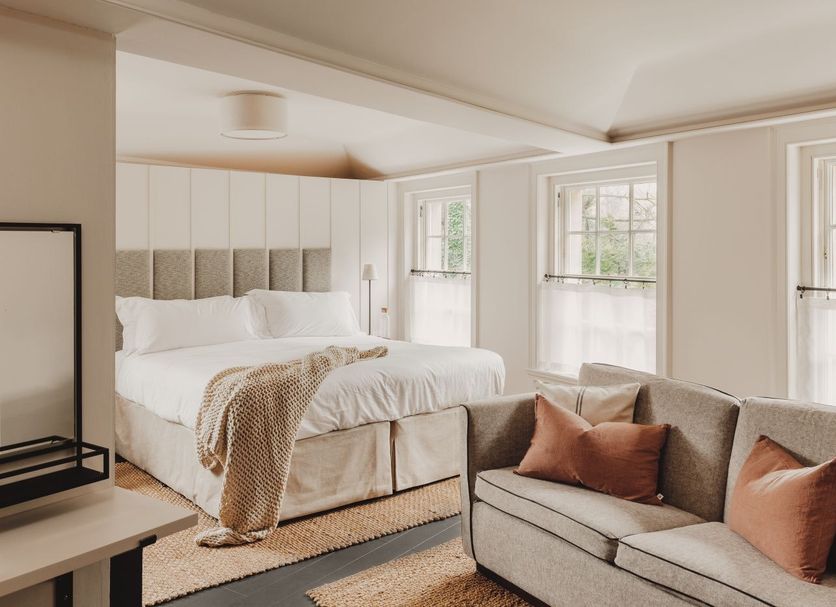 No 15 by GuestHouse, Bath guest room with bed, sofa, and large windows with natural light