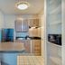 Studio 6 San Antonio, Tx - Medical Center kitchen with fridge, stove, microwave and dining counter