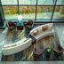 The Westin Southfield Detroit lounge with curved seating and floor-to-ceiling windows in Southfield