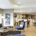 TownePlace Suites by Marriott Tampa South lobby suite with seating area and kitchen in Tampa